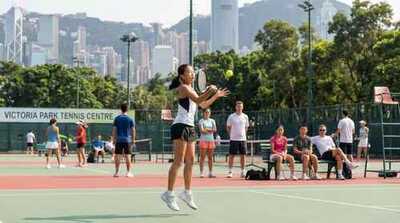 Junior girl practicing volley at Victoria Park