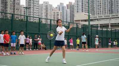 Junior girl practicing forehand at Victoria Park